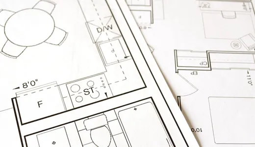 A printed architectural floor plan with dimensions marked along the walls